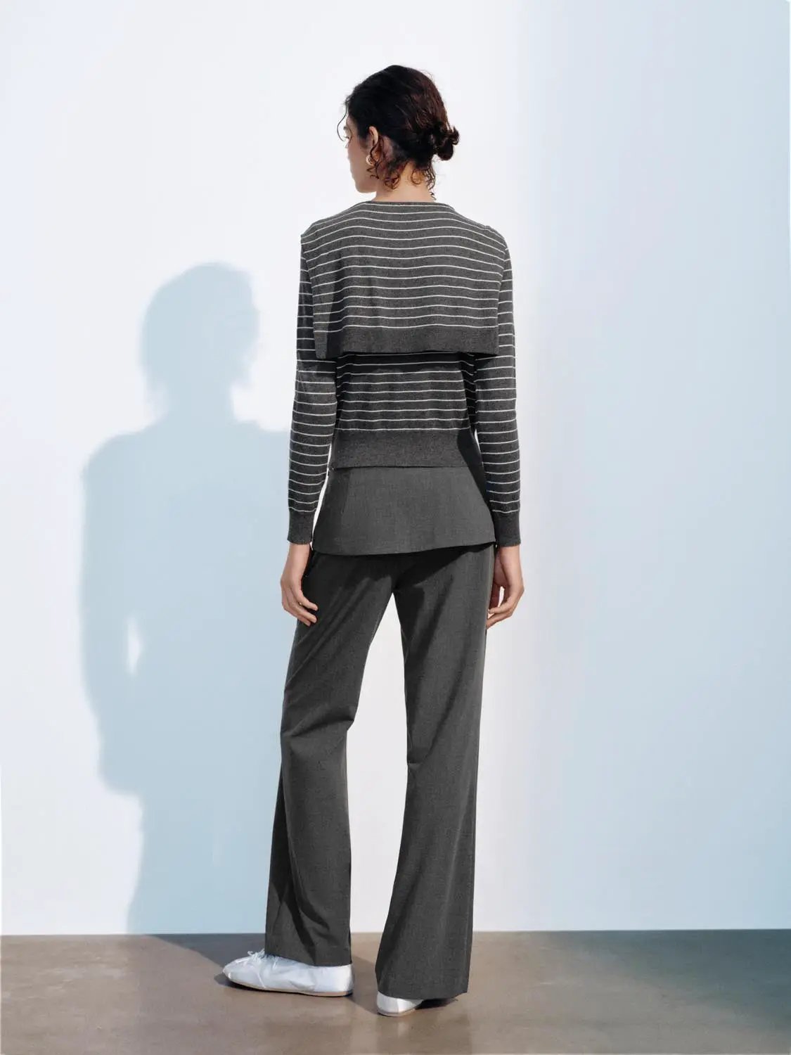 Knit jacket by Urban Revivo Fashion, gray striped knit cardigan, back view.