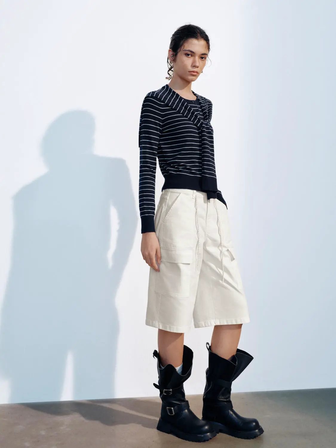 Knit Jacket, navy striped knit cardigan with tie-front, worn with beige cargo shorts and black boots