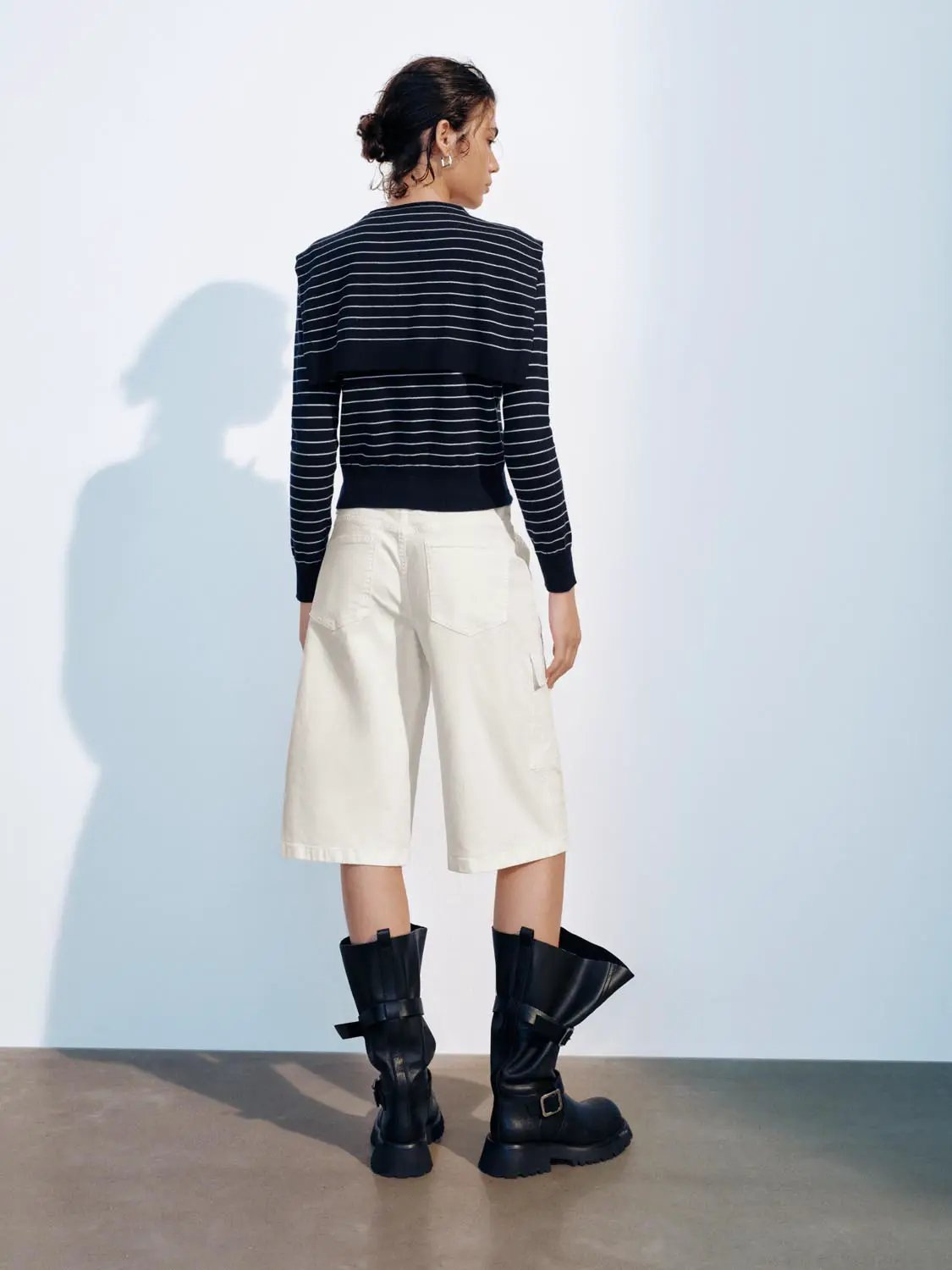 Knit Jacket: navy striped cardigan with white horizontal stripes, long sleeves.