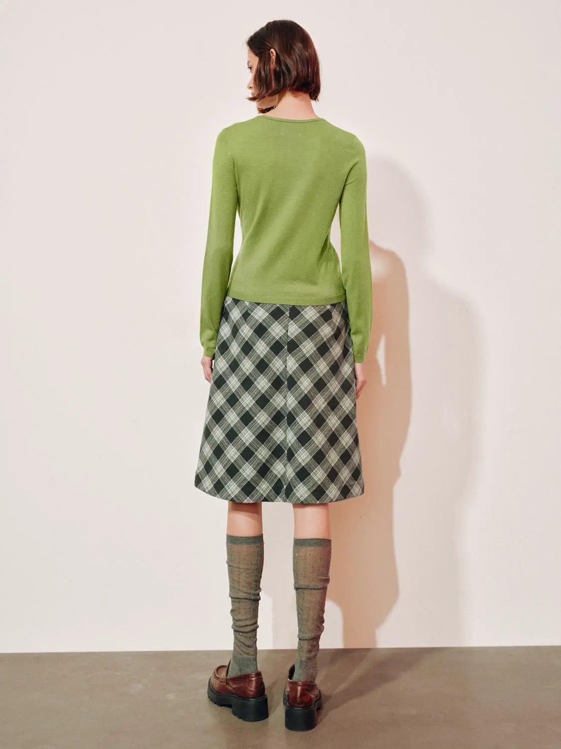Twisted Ruffle Round Neck Long Sleeve Knit Jacket; green knit cardigan with plaid skirt (two-piece outfit)
