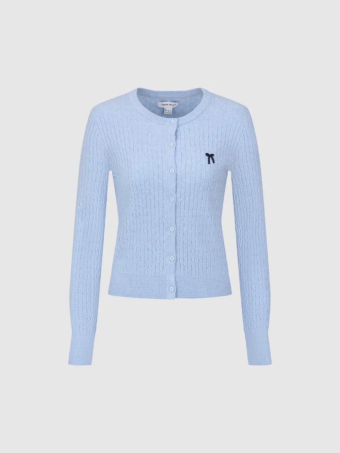 Knit cardigan in light blue with cozy cable knit, button front, small navy bow logo, Urban Revivo fashion label.