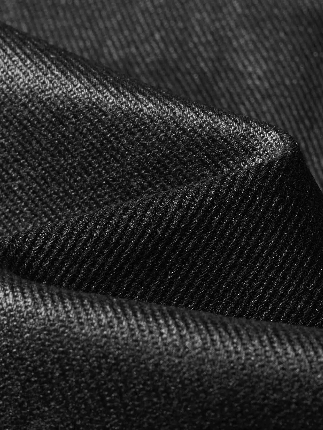 H-line Skirt in black textured fabric close-up view