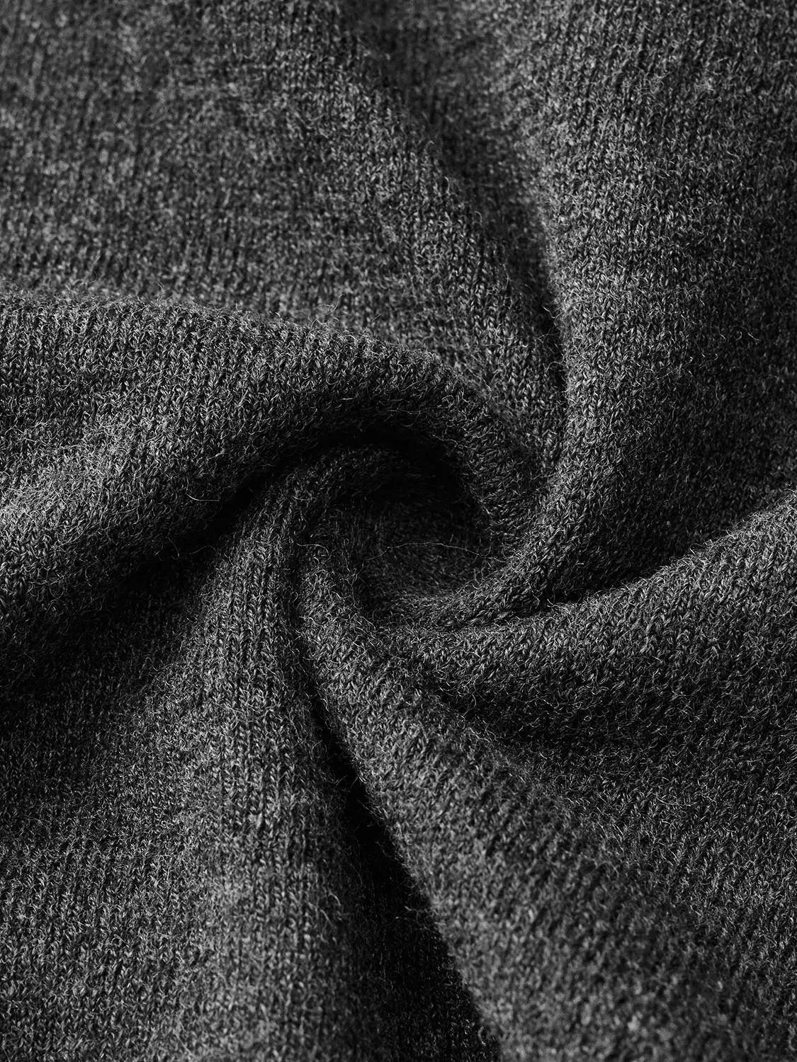 Knit jacket in charcoal grey knit with textured weave.