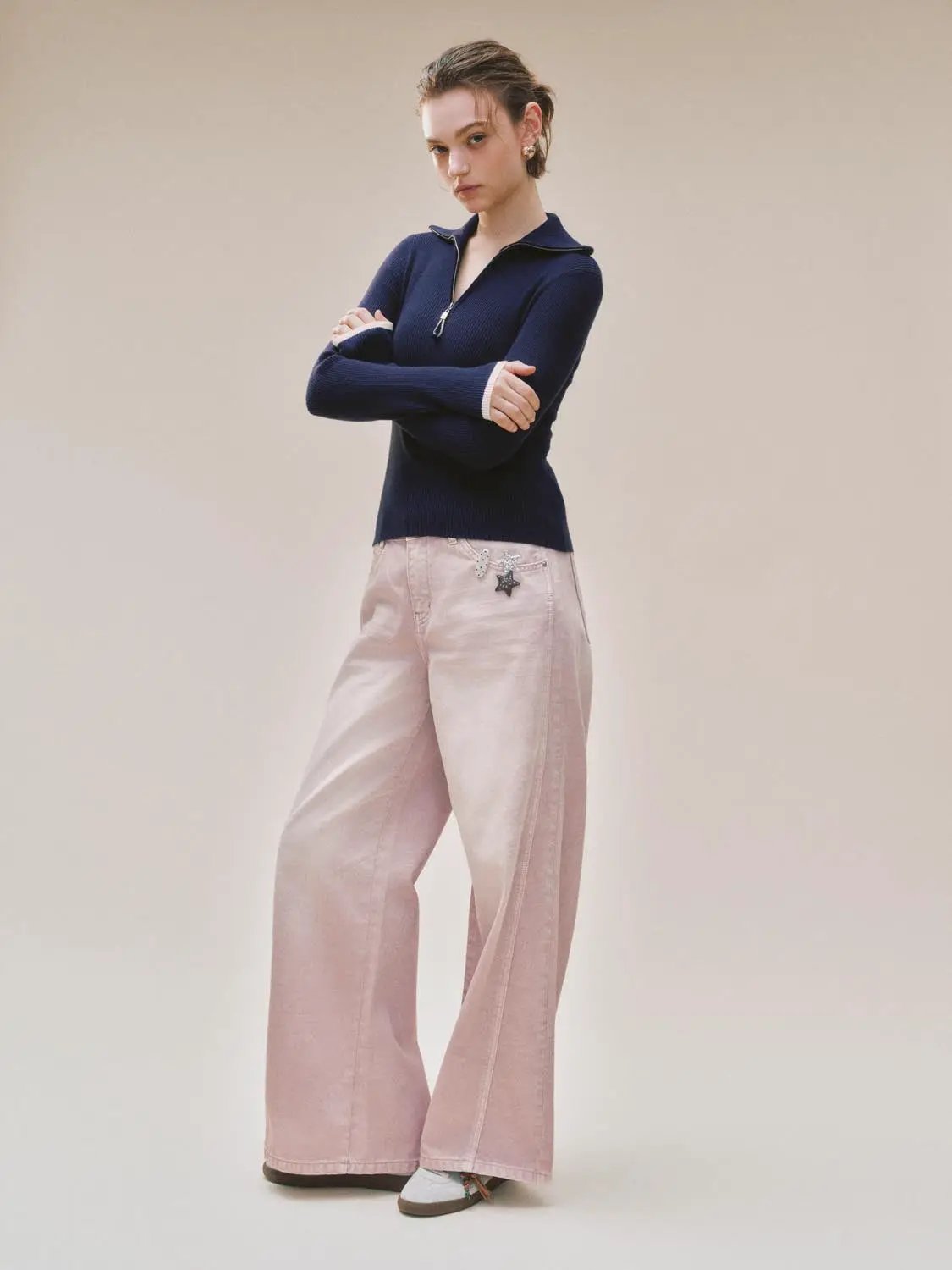 Knit T-Shirts set: navy zip-neck knit top and pale pink wide-leg jeans with star patches