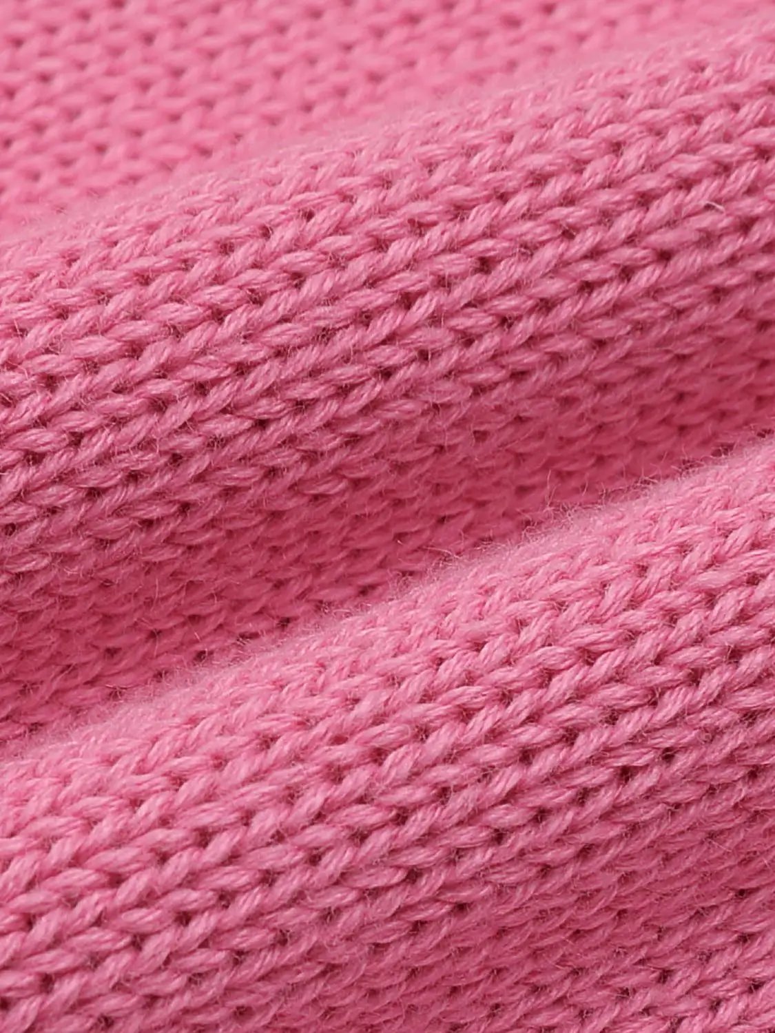Knit T-Shirt fabric in pink, close-up showing rib-knit texture.