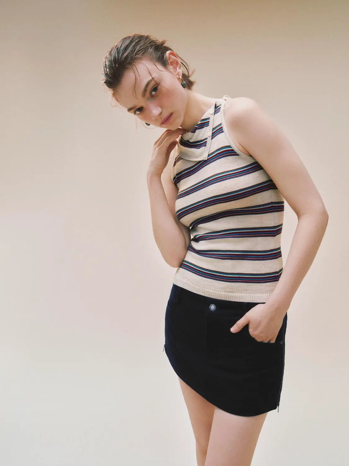 Striped Asymmetric Neckline Knit Tank Top; beige base with blue and red stripes.