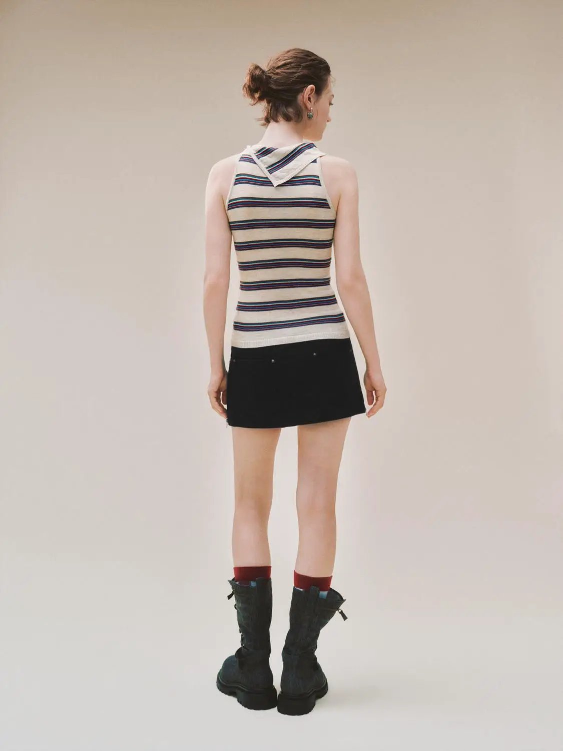 Striped Asymmetric-Neck Knit Tank Top on model; beige base with navy and red stripes.