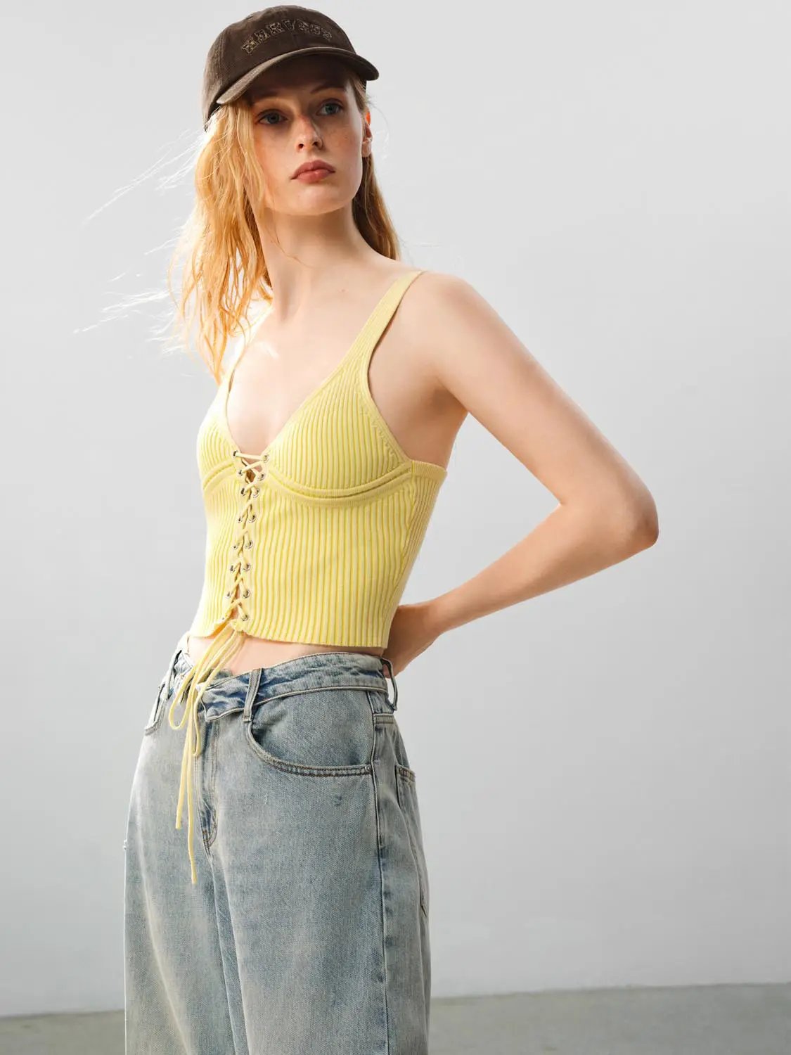 Ribbed lace-up sleeveless cotton cami top in yellow by Urban Revivo Fashion