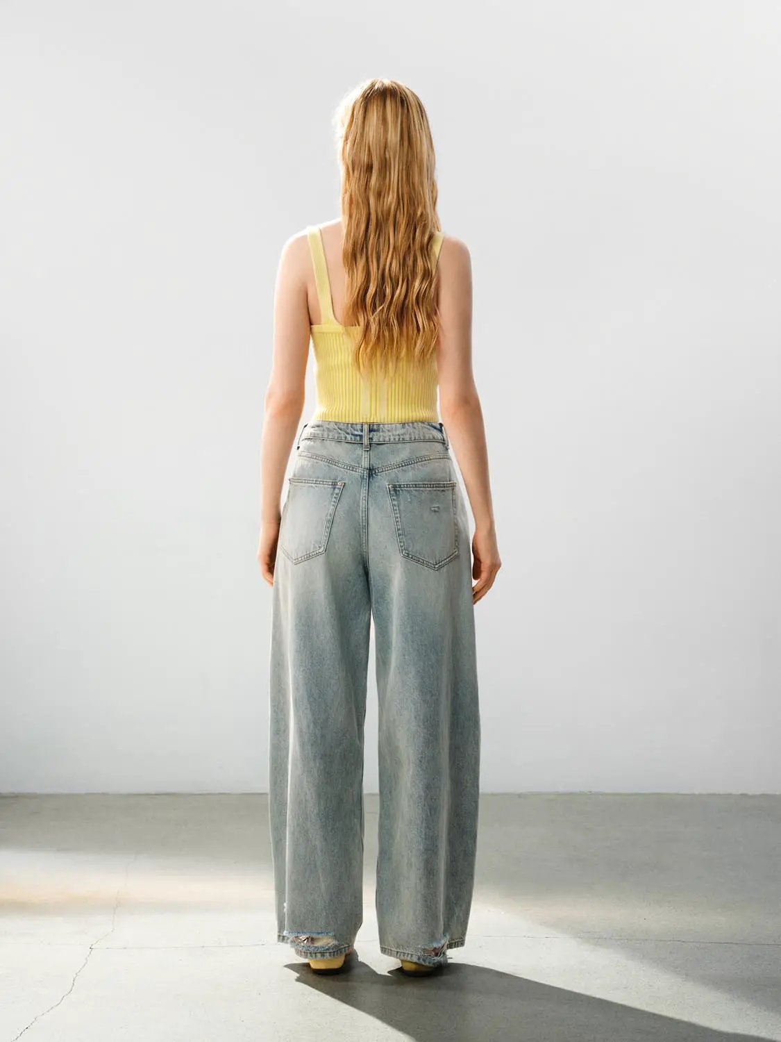 Ribbed Lace-up Sleeveless Cotton Cami Top in yellow, shown with light-wash wide-leg jeans; Urban Revivo Fashion