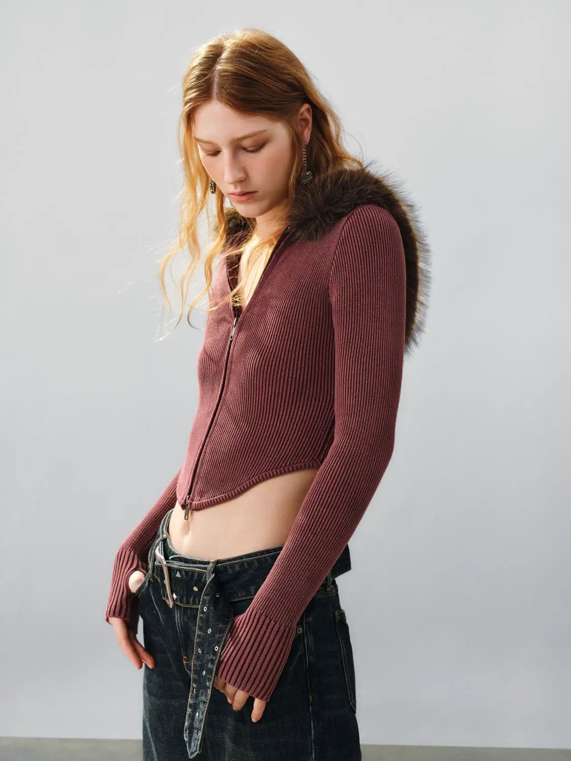Knit jacket in burgundy ribbed knit with front zipper and cropped length