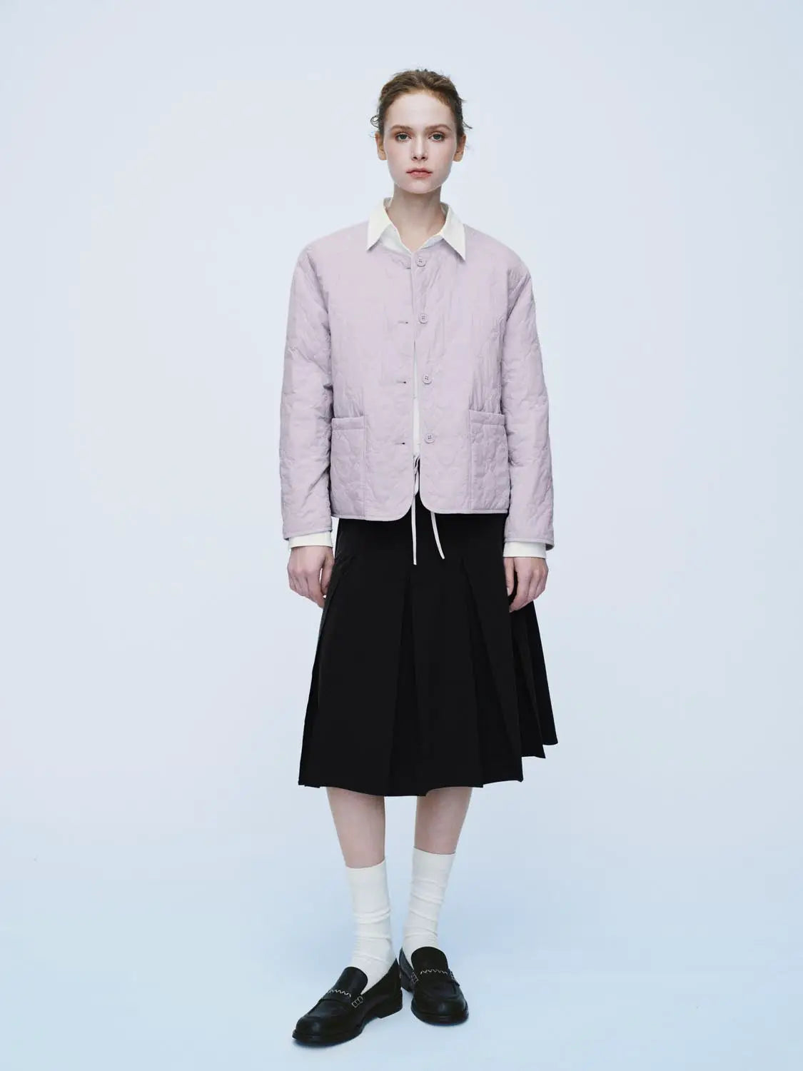 Padded jacket by Urban Revivo Fashion in pale lavender quilted fabric with button-front and pockets.