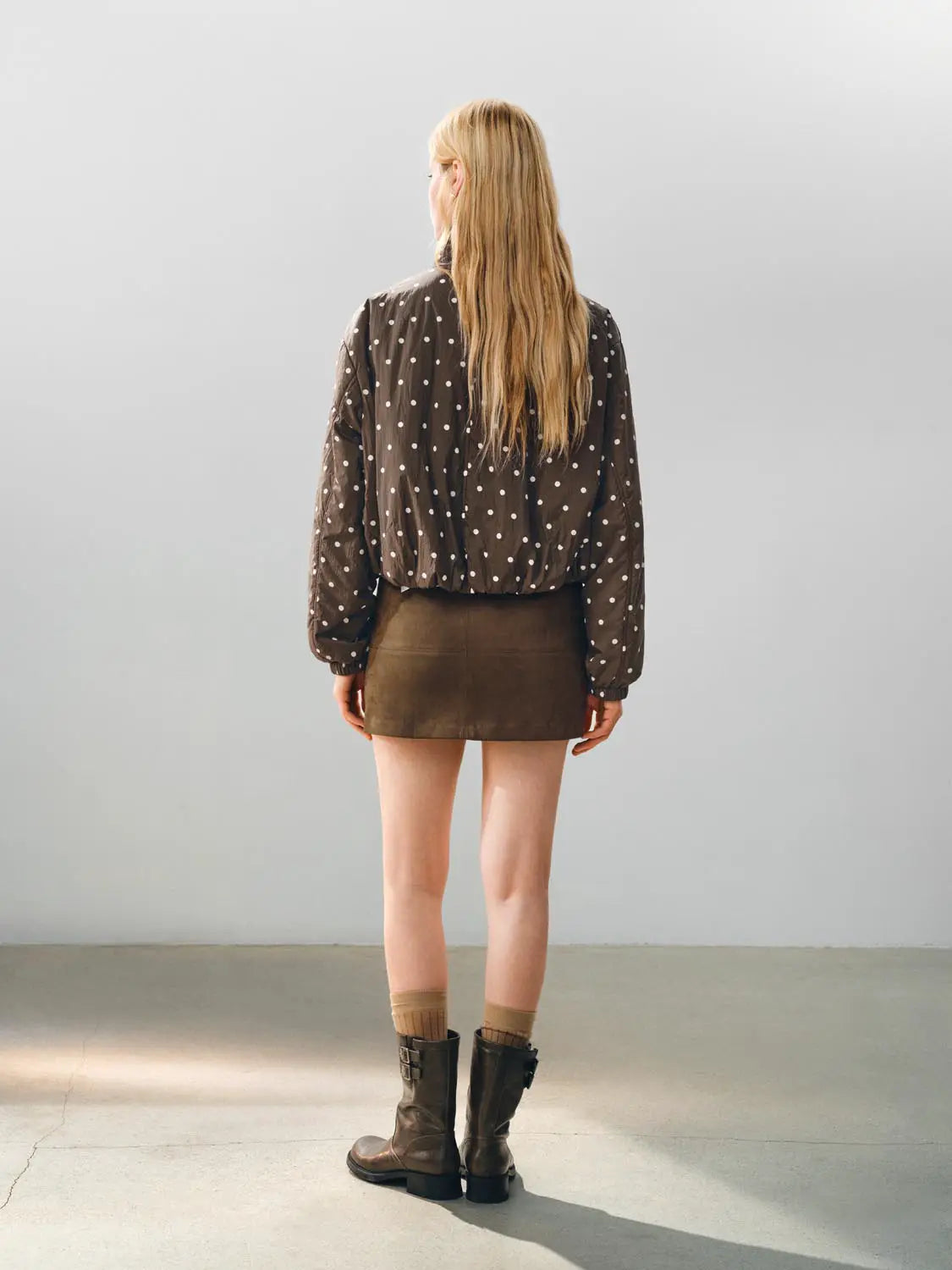 Padded jacket by Urban Revivo Fashion; brown with white polka dots, balloon sleeves, waist-cinched.