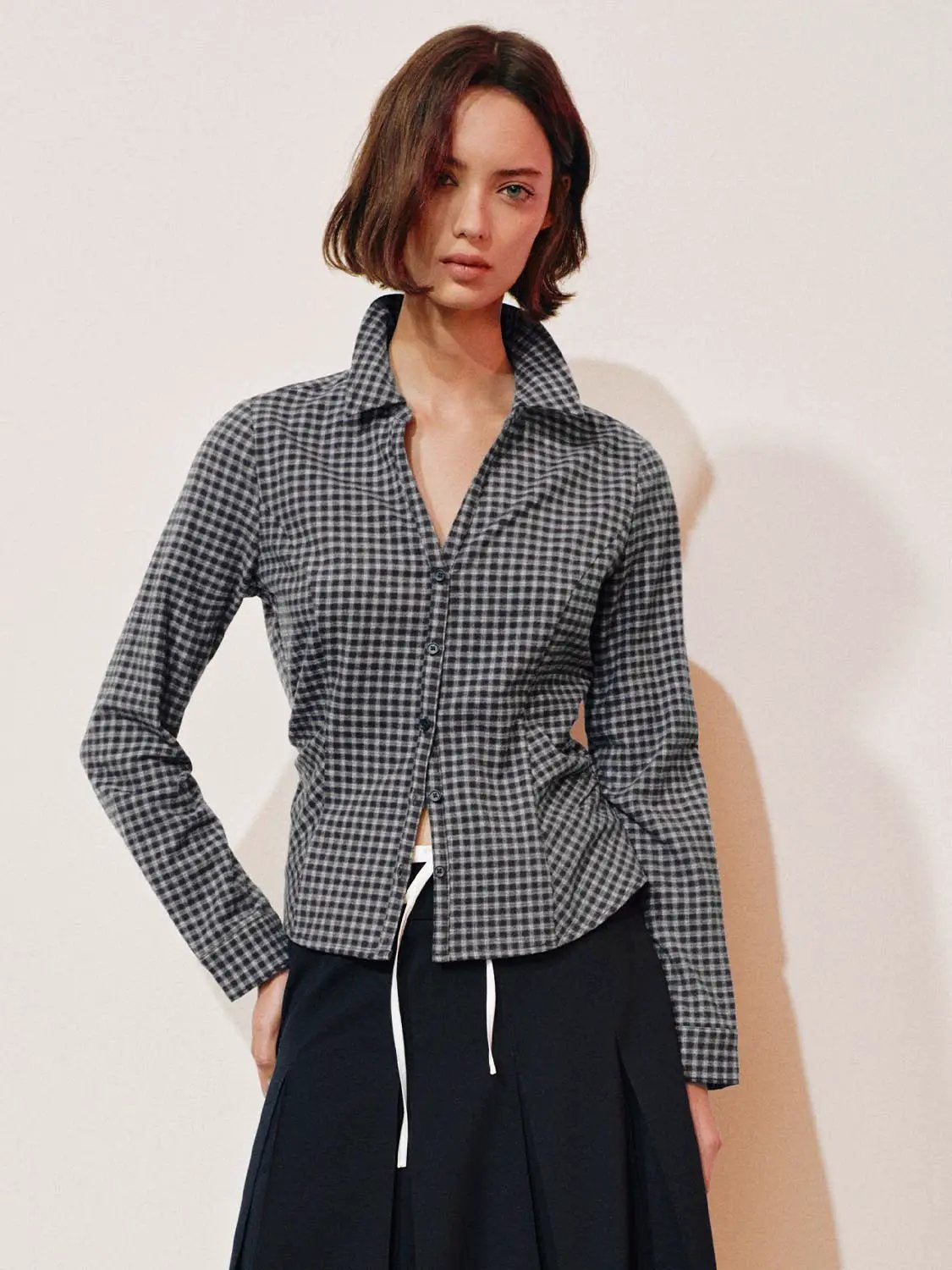 Button-front shirt in gray and black gingham with long sleeves and collar