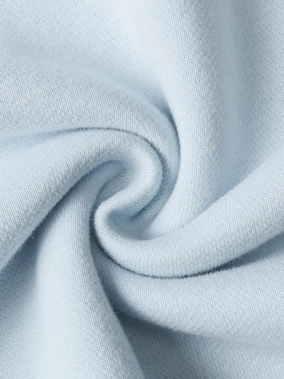 Sweatshirt fabric close-up in pale blue knit; Urban Revivo Fashion.