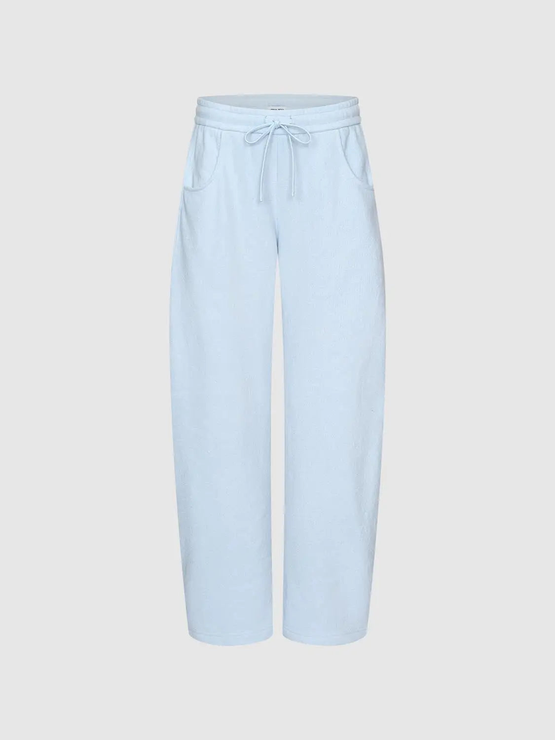 Barrel-Leg Pants in light blue with drawstring waist and pockets, Urban Revivo Fashion.