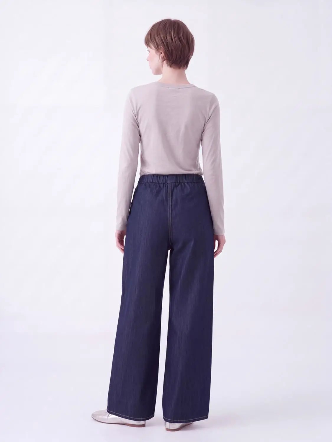 Elastic Waist Side Stripe Side Split Wide Leg Denim Pants in dark indigo, back view