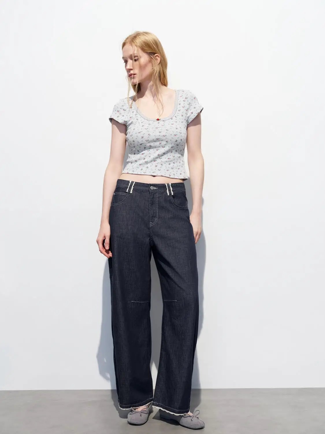 High-waisted wide-leg washed cotton jeans in dark denim