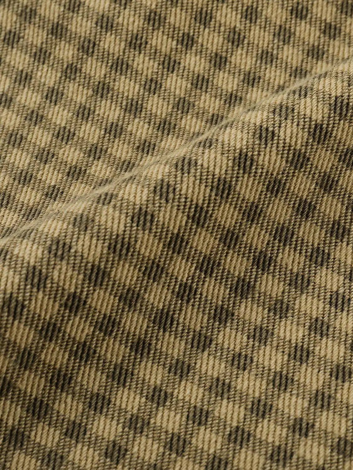 Denim jeans with leopard-print pattern in tan and black tones