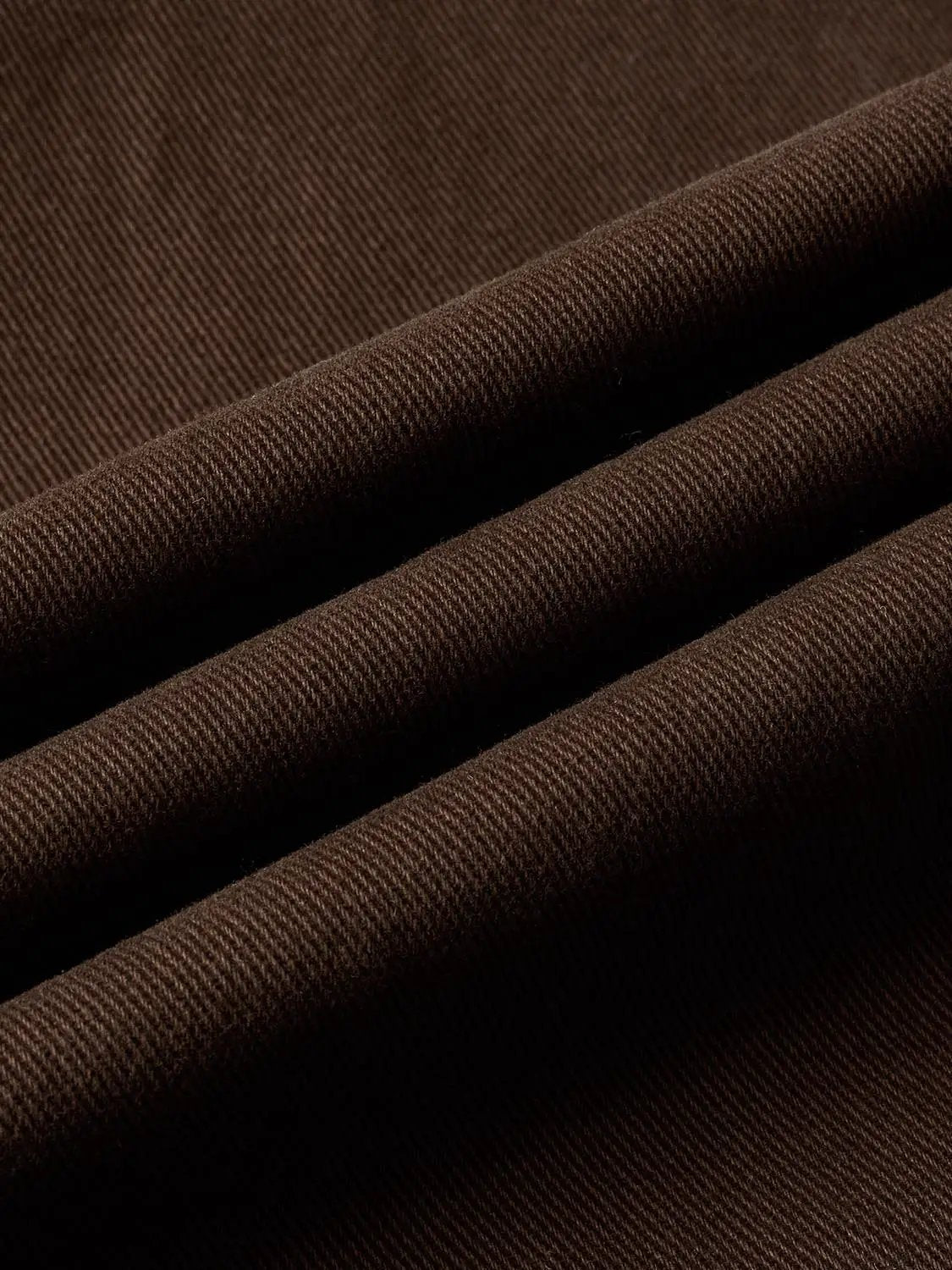 Casual Jeans brown denim fabric close-up by Urban Revivo Fashion