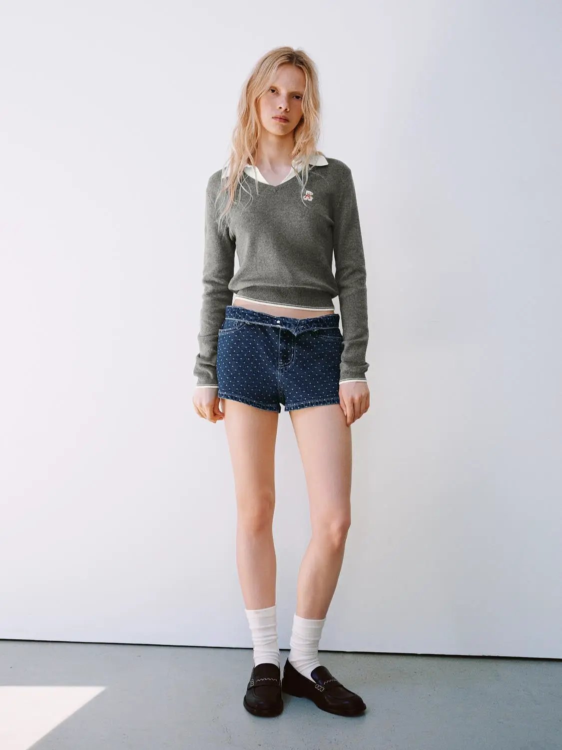 Knit T-Shirt; grey knit top with white collar trim, paired with blue polka-dot denim shorts