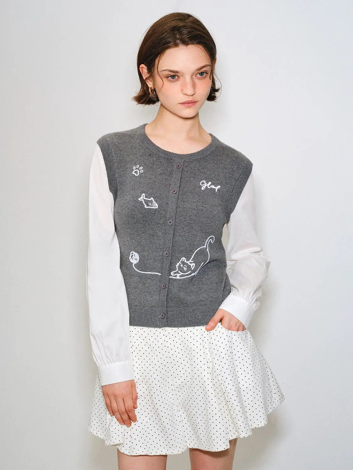 Knit T-Shirt by Urban Revivo Fashion; gray knitted top with button front and small white cat doodles.