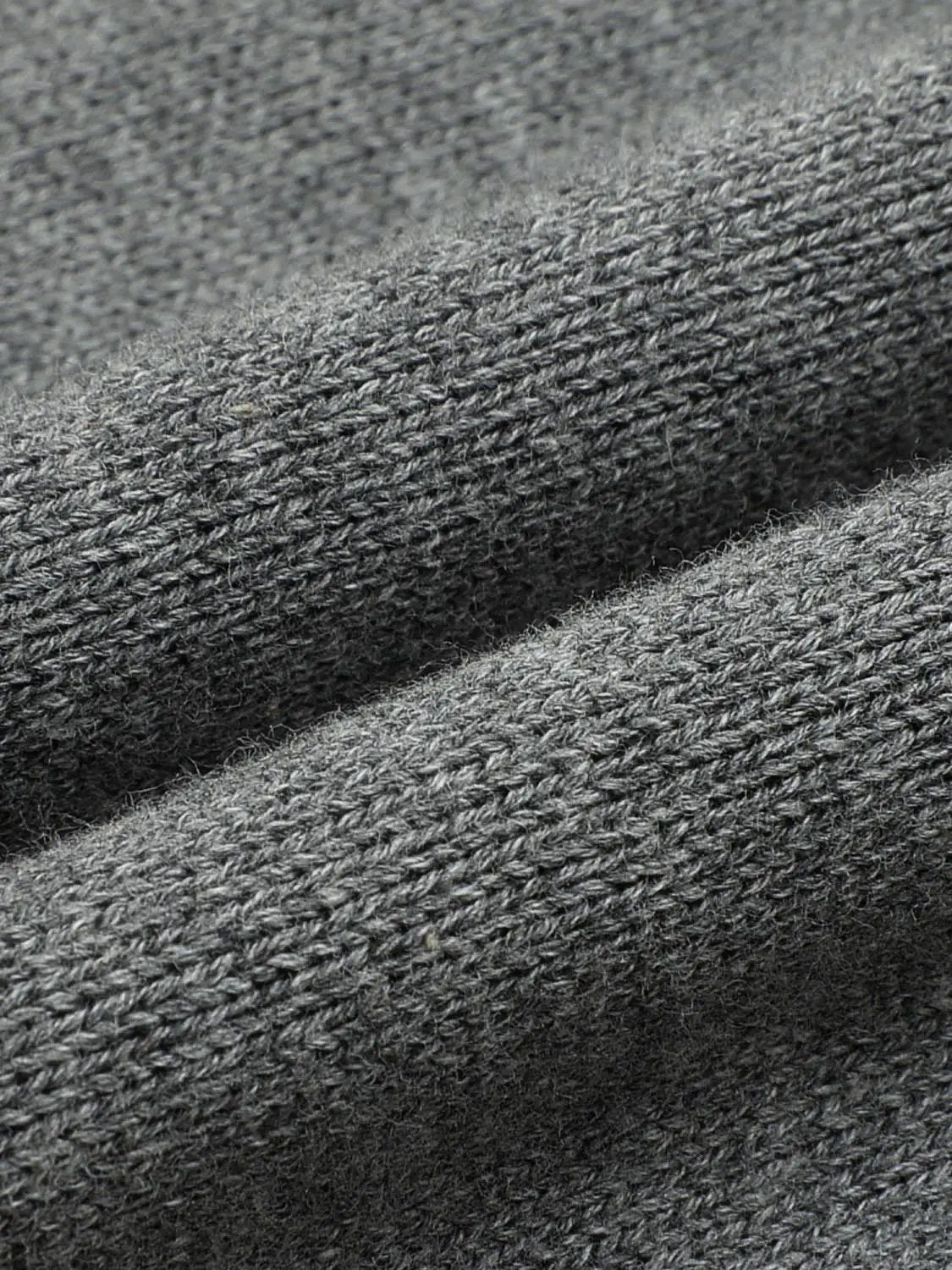 Knit T-Shirt gray knitted fabric close-up texture detail