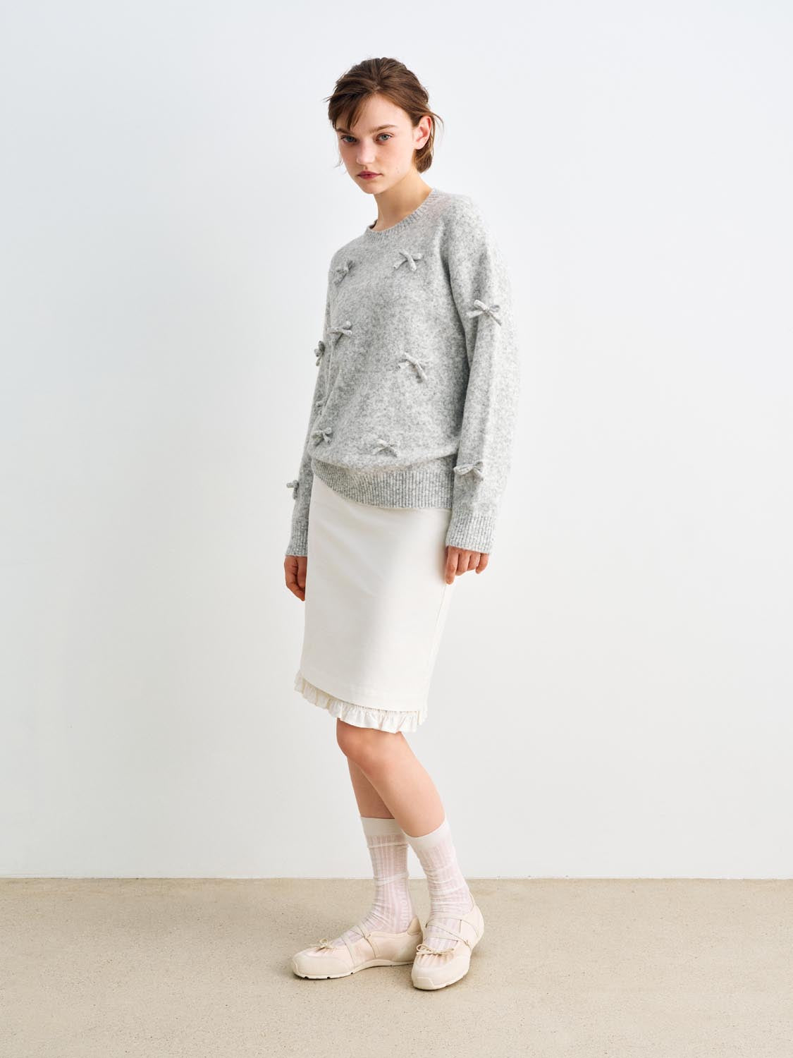 Knit T-Shirt by Urban Revivo Fashion in light gray knit with bow embellishments; ribbed hem and cuffs.