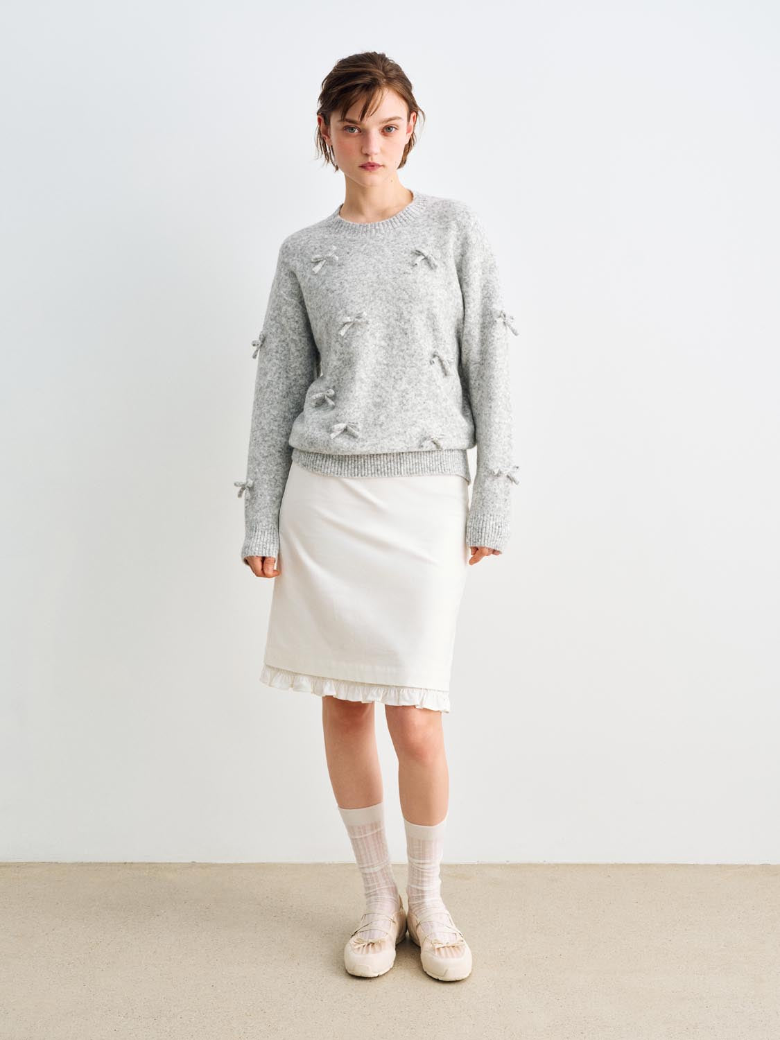 Knit T-Shirt, grey heather knit with bow accents on front and sleeves; ribbed crew neck.