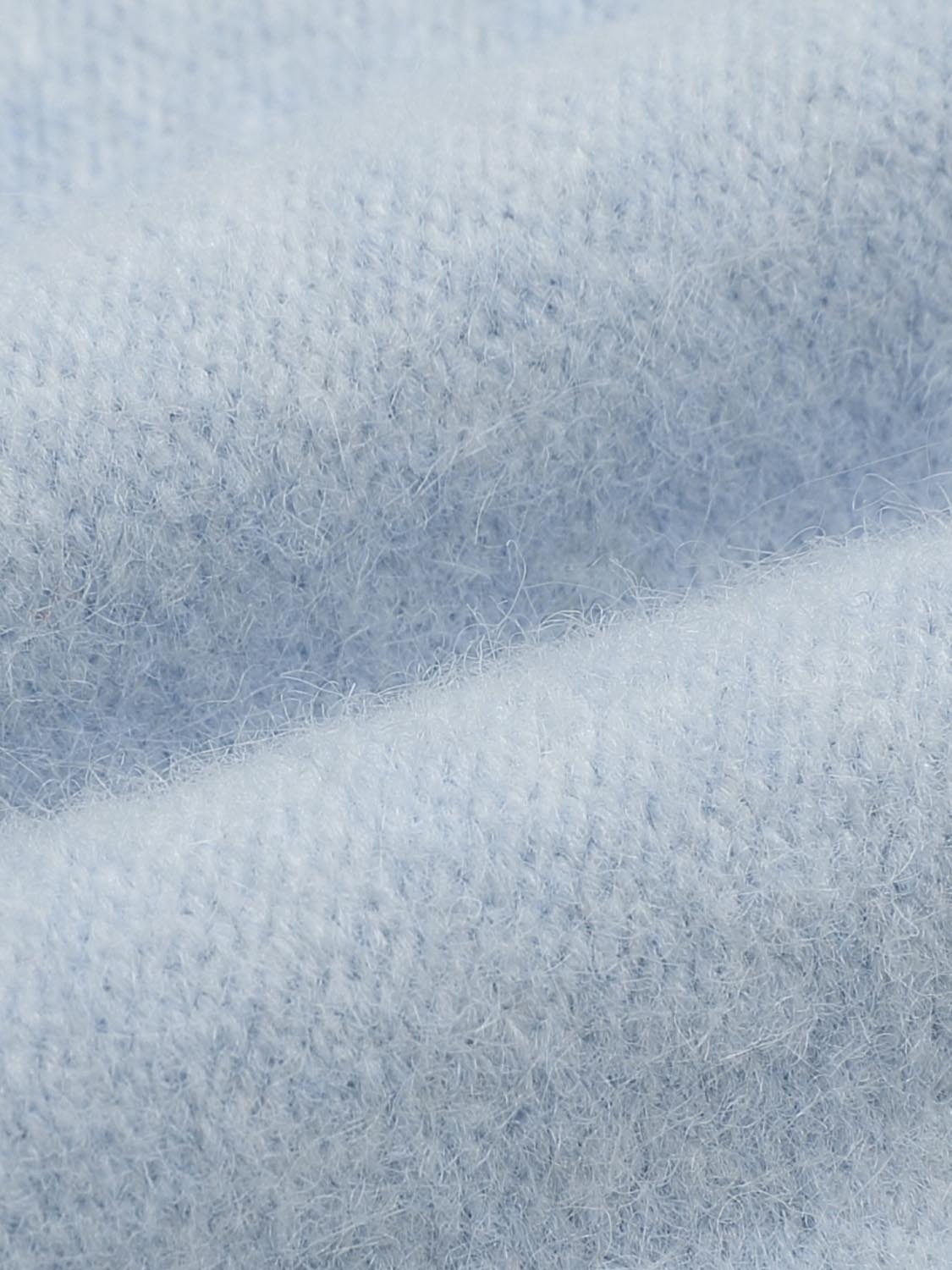 Knit T-Shirt fabric in light blue with a soft fuzzy texture