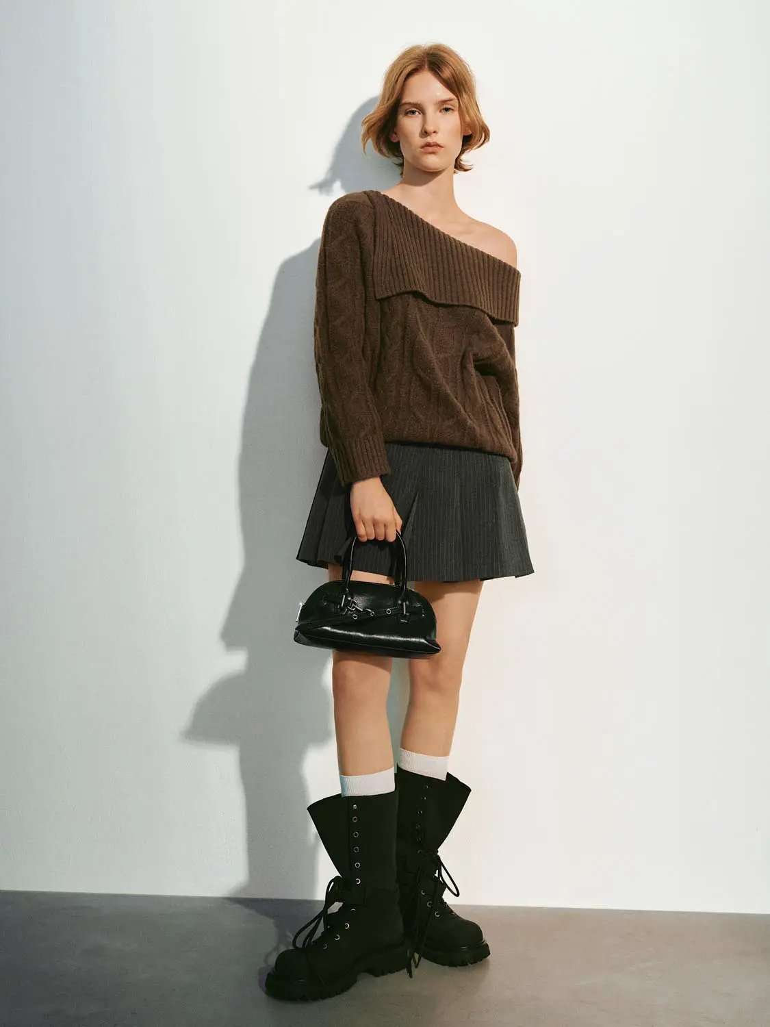Knit T-Shirts brown off-shoulder knit top with ribbed neckline; pleated skirt, black combat boots, Urban Revivo Fashion