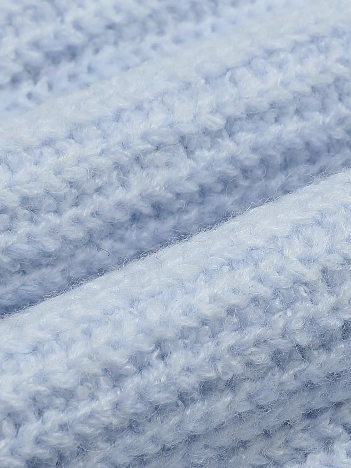Knitted cardigan in light blue, soft fuzzy yarn texture
