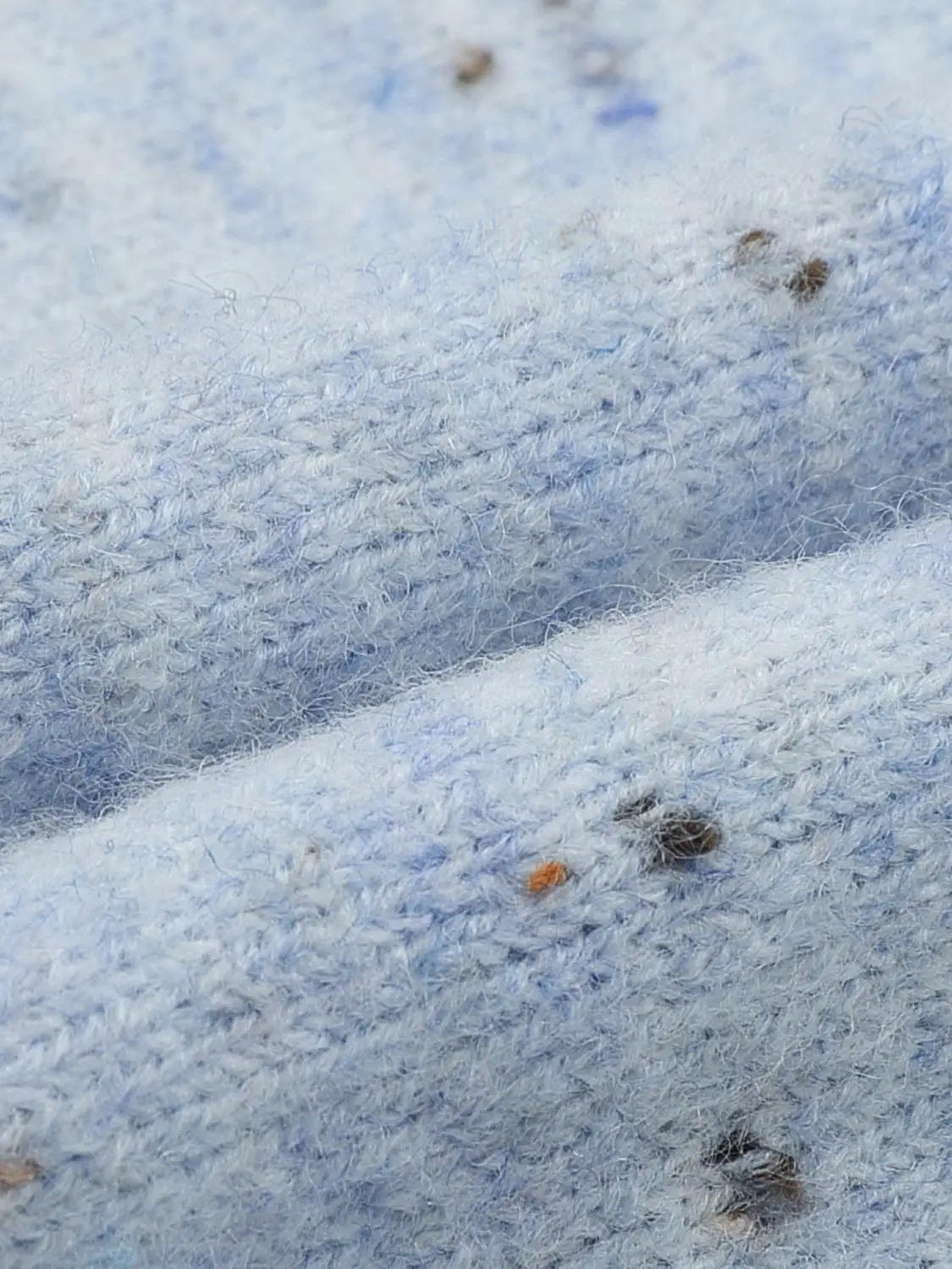 Embroidered Floral Knit Polo Collar Long Sleeve Sweater close-up of light blue fuzzy knit fabric