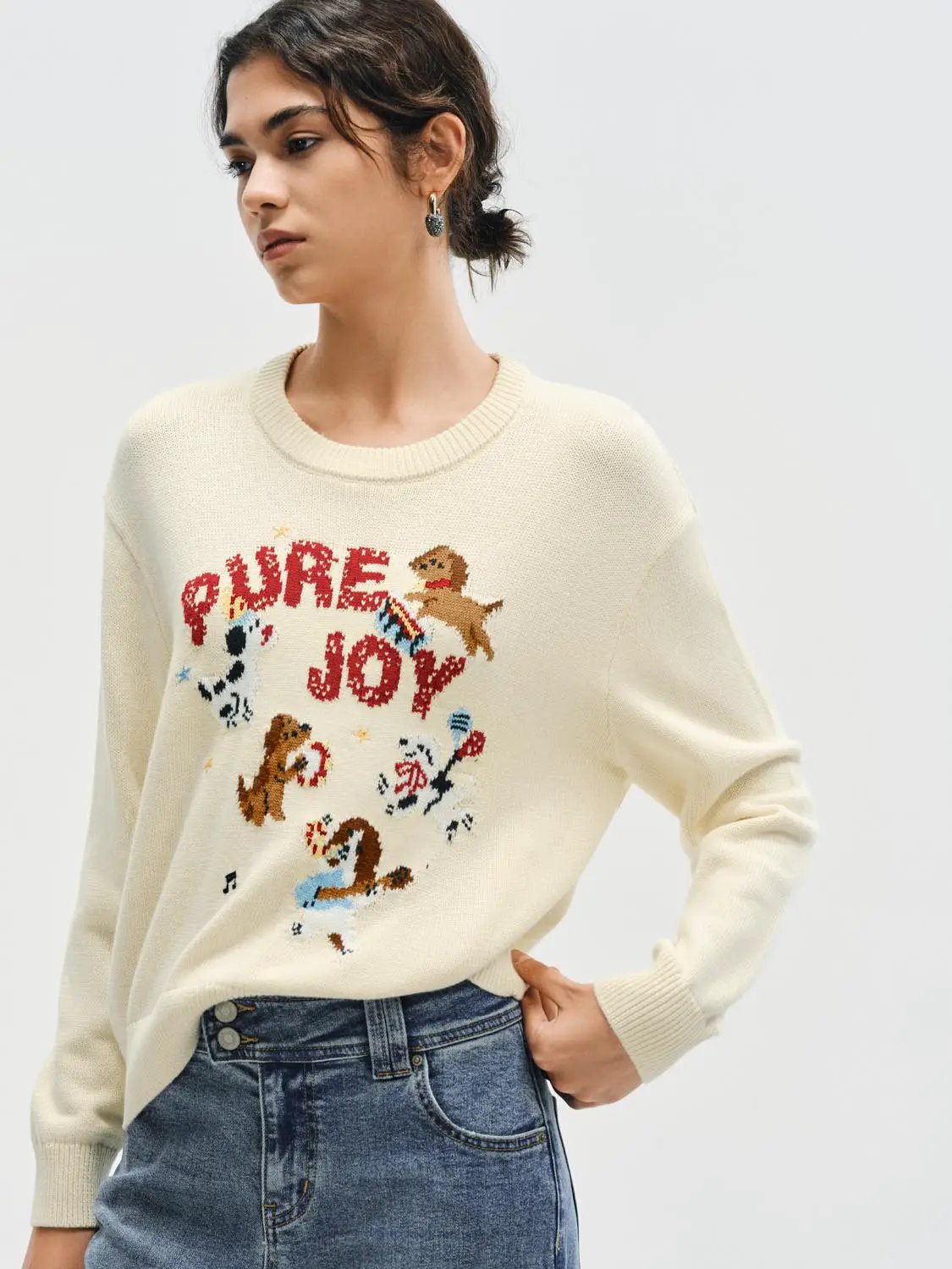 Knit T-Shirts in cream with a colorful PURE JOY graphic and playful characters