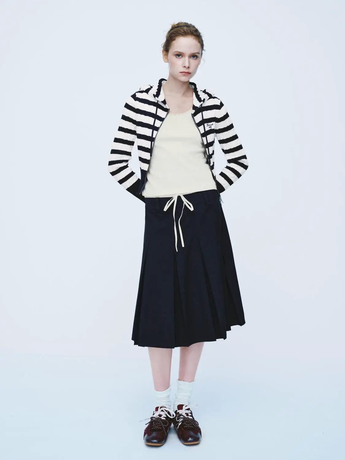 Knit striped cardigan jacket in black and white with hooded zip front