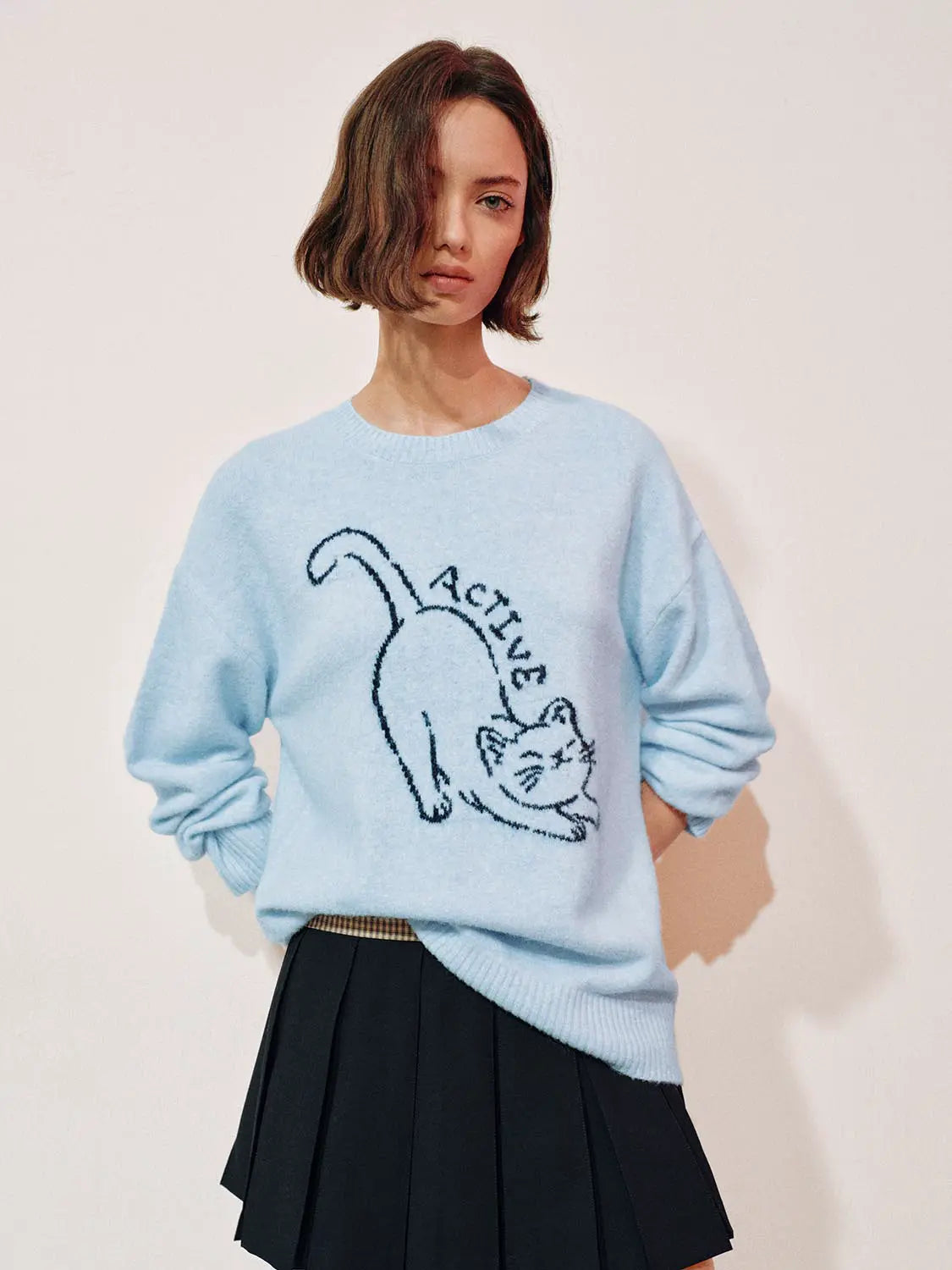 Knit T-Shirt in light blue with a cat graphic design
