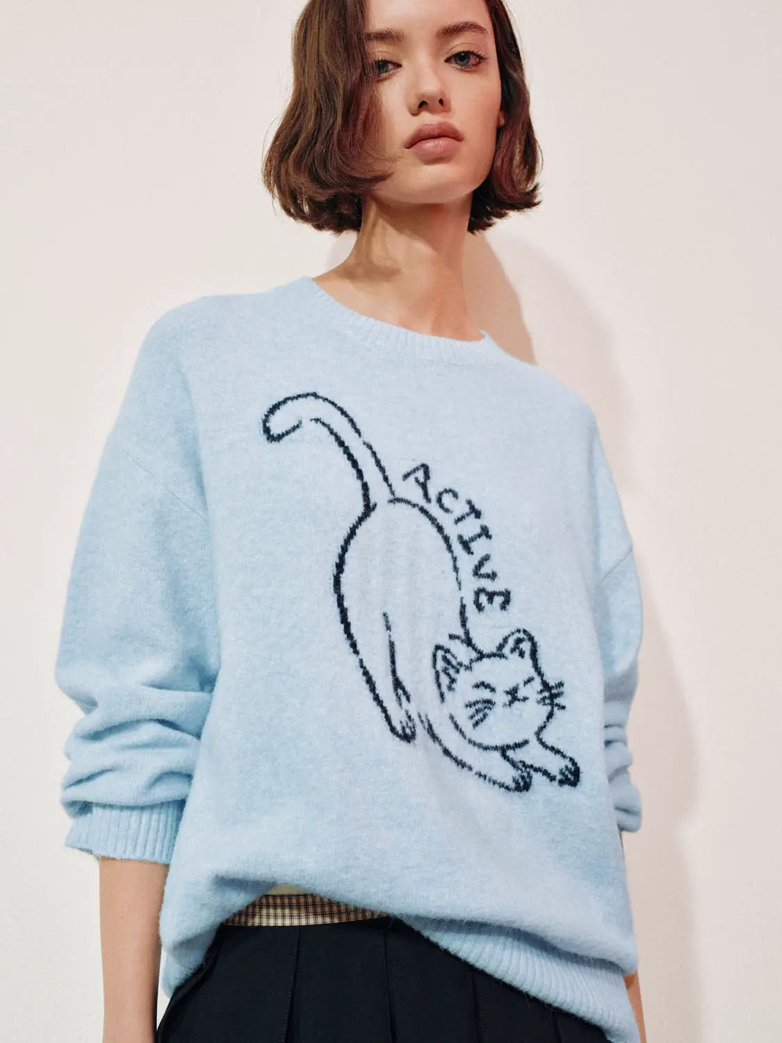 Knitted T-shirt in light blue with a cat graphic by Urban Revivo Fashion