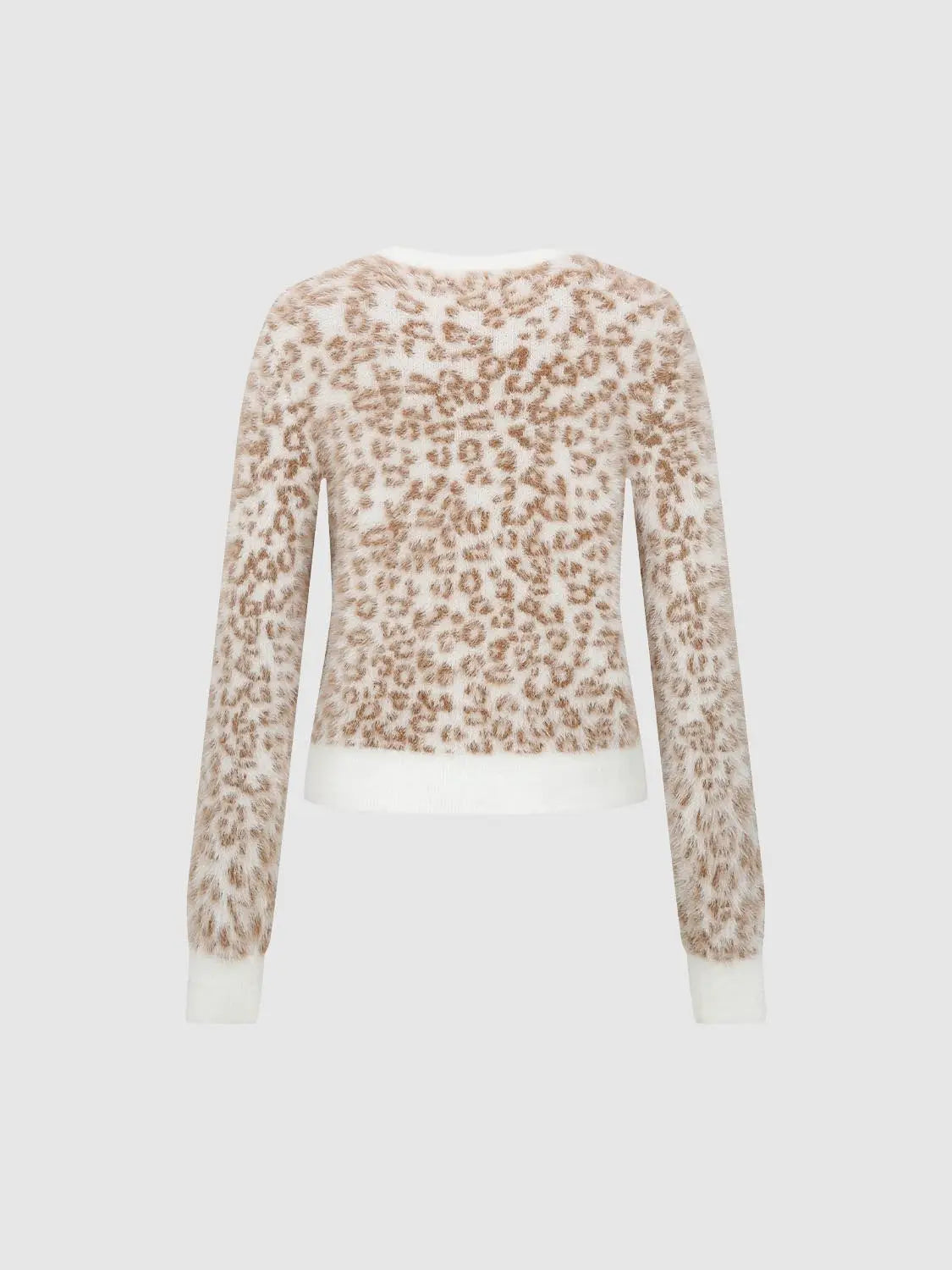 Knit cardigan by Urban Revivo Fashion in leopard print; cream base with white cuffs and hem.