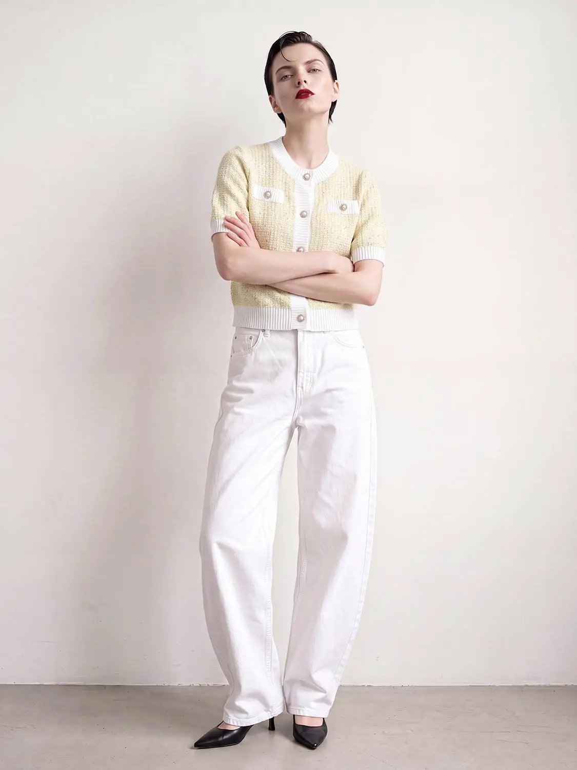 Textured Weave With Contrast Trim Cardigan in cream with white trim; short-sleeve, button-front, two pockets.