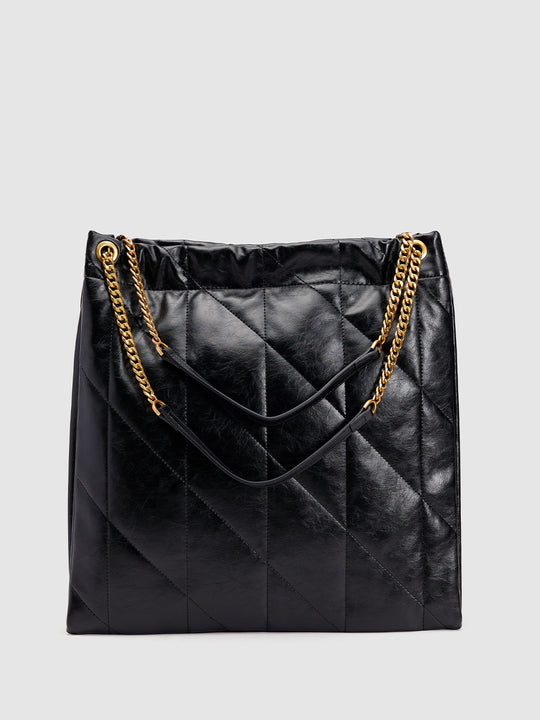 Sac à bandoulière matelassé en cuir vegan gaufré