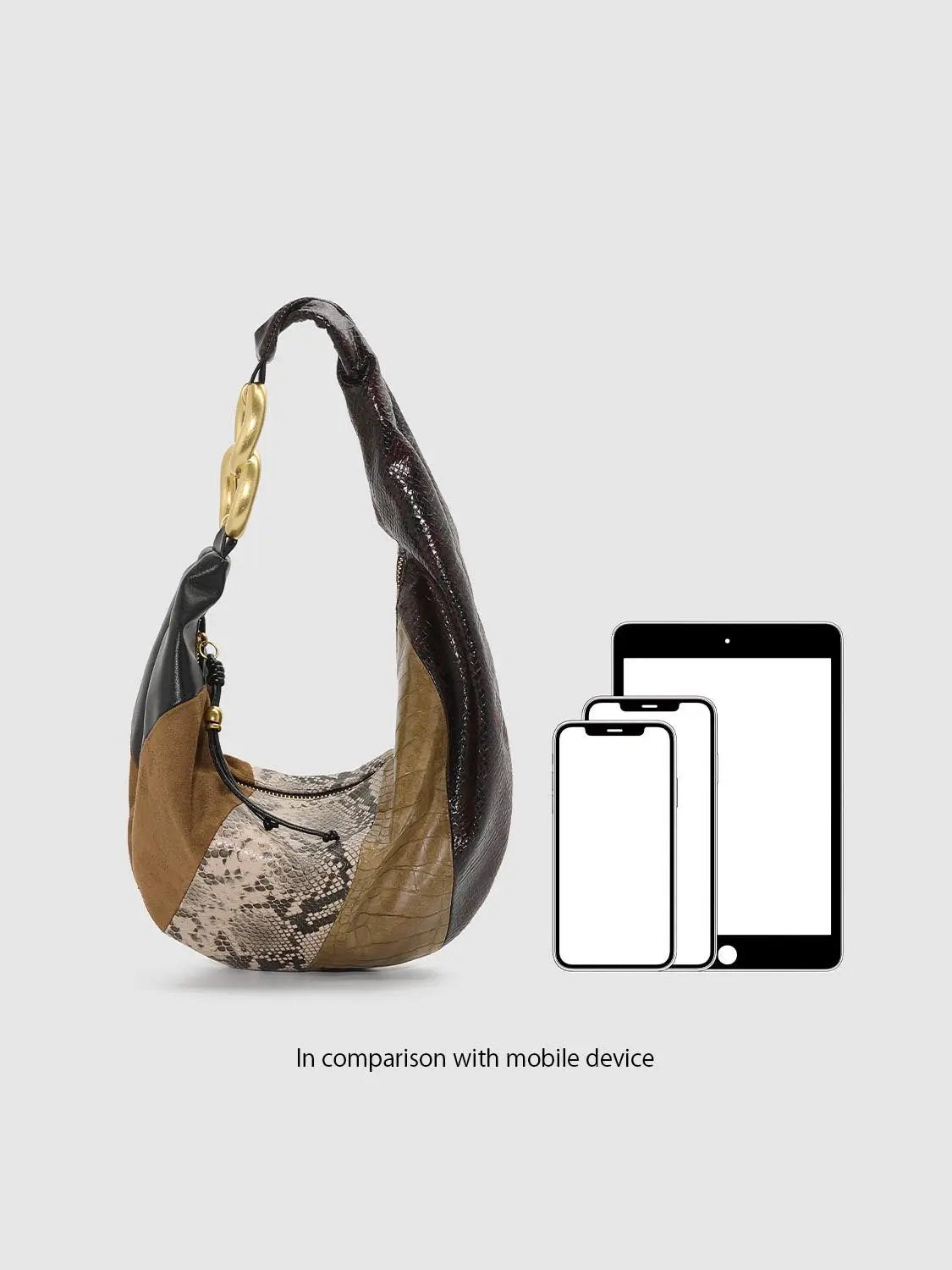 Shoulder bag with brown suede, snake-print, and crocodile-embossed panels; gold-tone hardware.