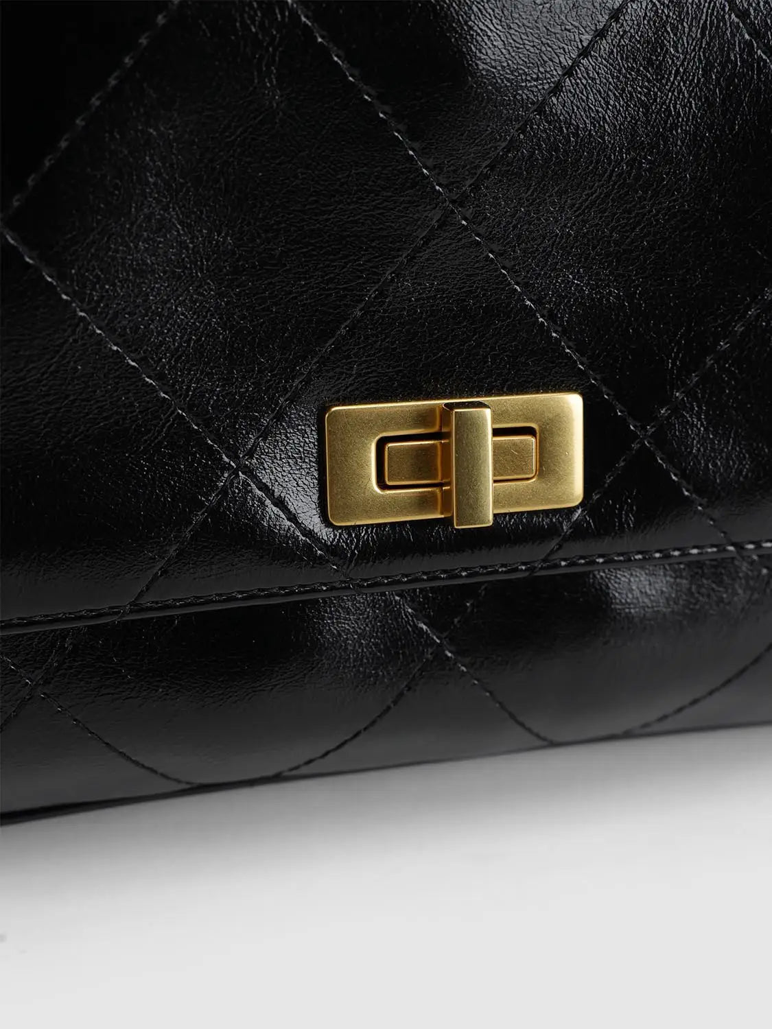 Shoulder & Crossbody Bag by Urban Revivo Fashion, black quilted leather with gold-tone turn-lock clasp.