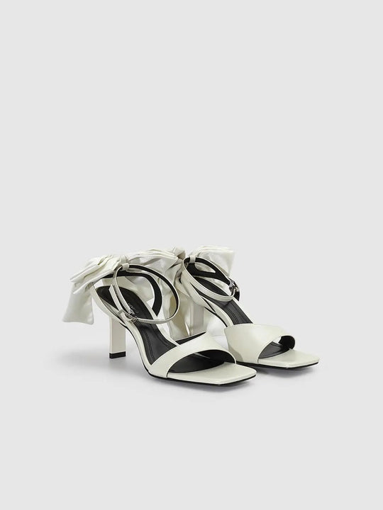 Cream Synthetic Leather Bow Tied Heeled Sandals