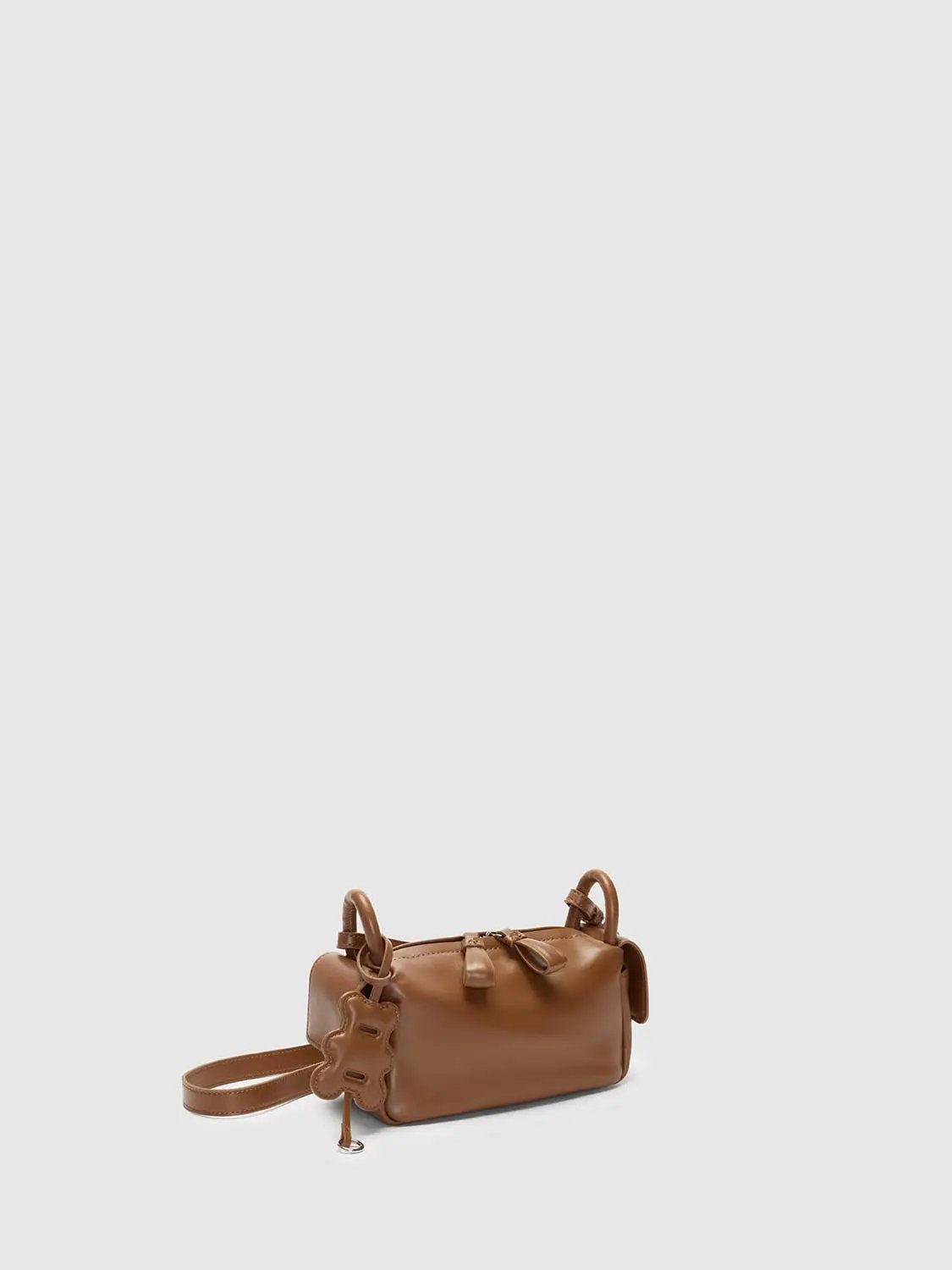 Top Handle & Crossbody Bag in tan brown leather by Urban Revivo Fashion with dual handles and crossbody strap.