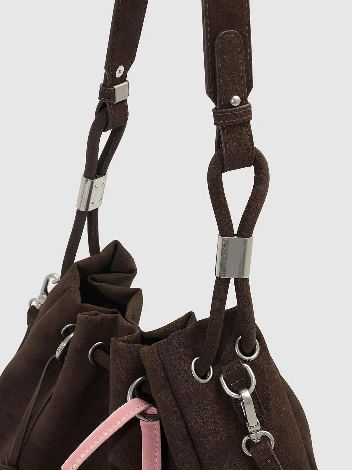 Shoulder & Crossbody Bag in brown suede with pink strap accents and silver hardware