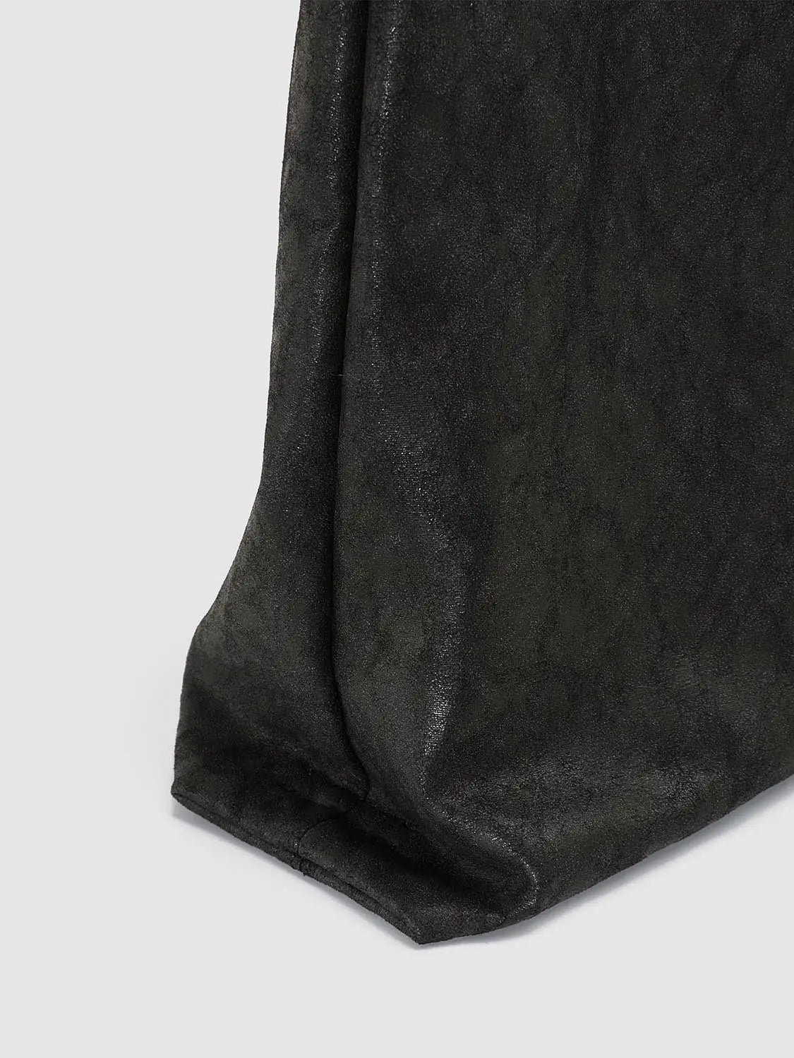 Shoulder bag with black metallic faux suede fabric and subtle shine