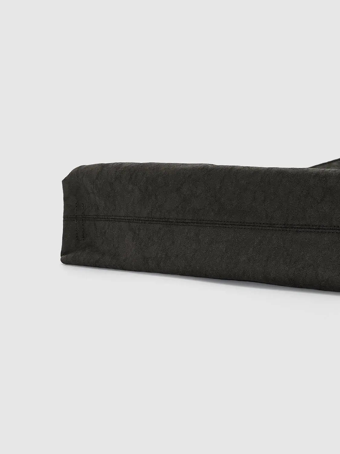 Shoulder bag by Urban Revivo Fashion in black textured fabric with stitched seam