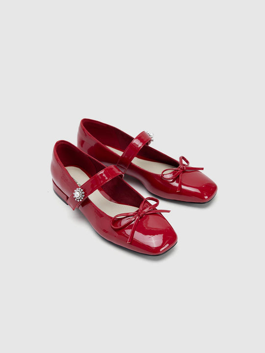 Pumps mit Schleifendekor und niedrigem Schaft