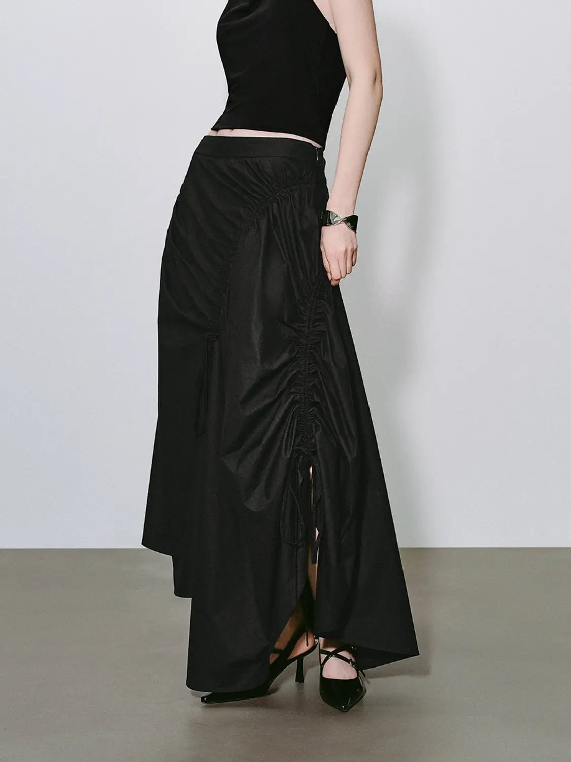 High-Waisted A-Line Cotton Skirt with ruched drawstring, irregular hem and slit in black; Urban Revivo Fashion.