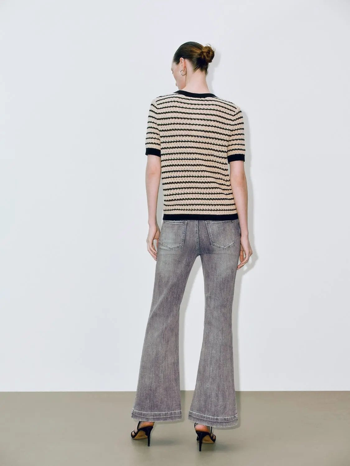 Round-neck striped knit short-sleeve cotton T-shirt by Urban Revivo Fashion; beige body with black stripes, navy cuffs.