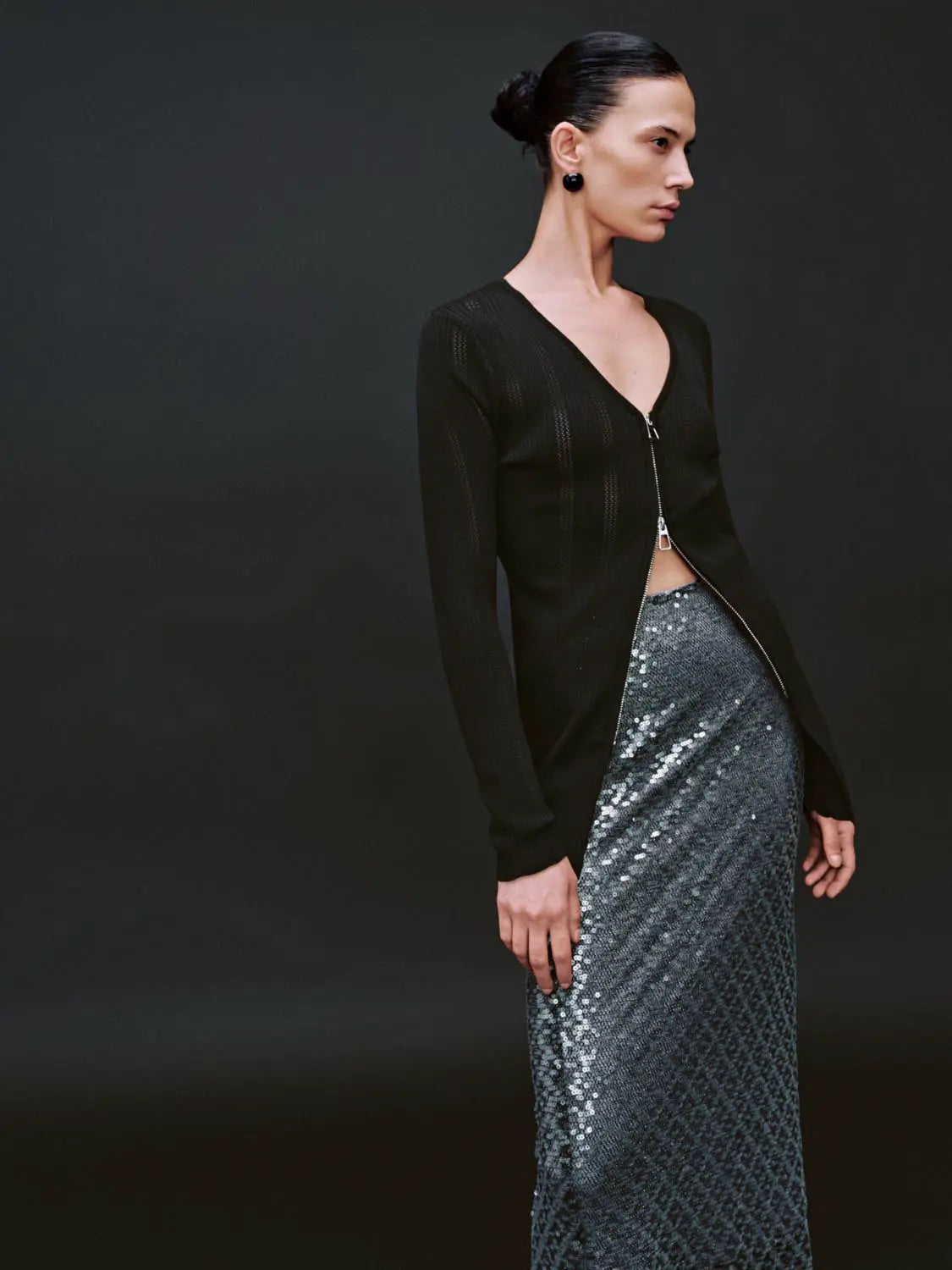 Zip Up Front Knitted Cardigan in black with a silver sequin maxi skirt; two-piece Urban Revivo Fashion outfit.